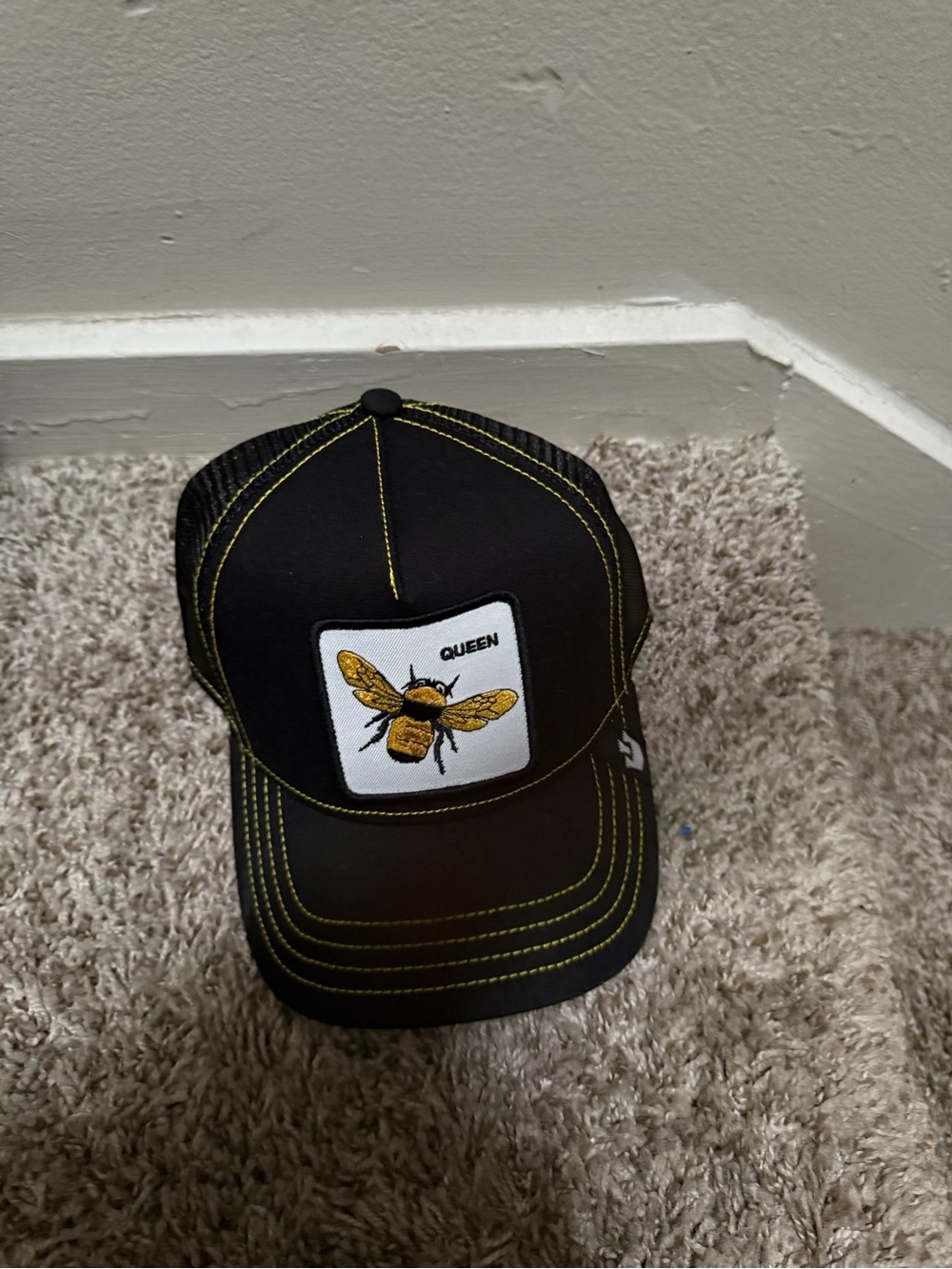 Goorin Bros Black Trucker Hat with Yellow Bee Patch
